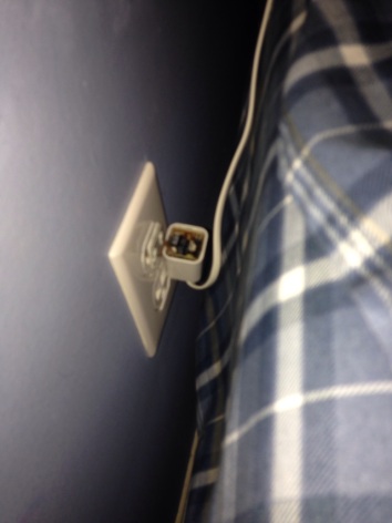 Iphone adapter broke while plugged into wall, is there a safe way to remove it